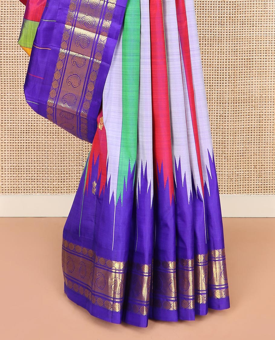 Multi-Colored Kanchipuram Silk Saree Accentuated with Stripes and Zari Buttas All Over Its Body, Complemented by Contrast Thzampoo Rekku One-sided Border Featuring Rudraksham and Manga Designs, Zari Design Pallu, and Comes Without a Blouse