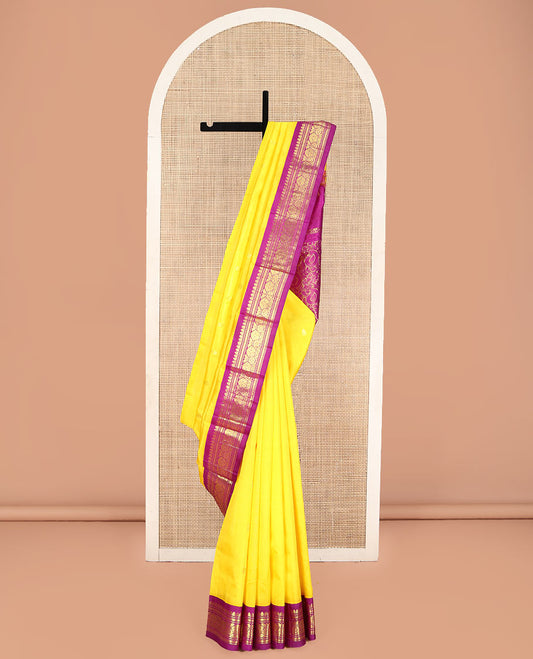 Yellow Kanchipuram Silk Saree, Mesmerized with Zari Buttas, Complemented by Contrast One-Sided Korvai Border of Banaras and Rettai Neli Designs, Pallu of Paisley and Floral Designs, and Comes Without a Blouse