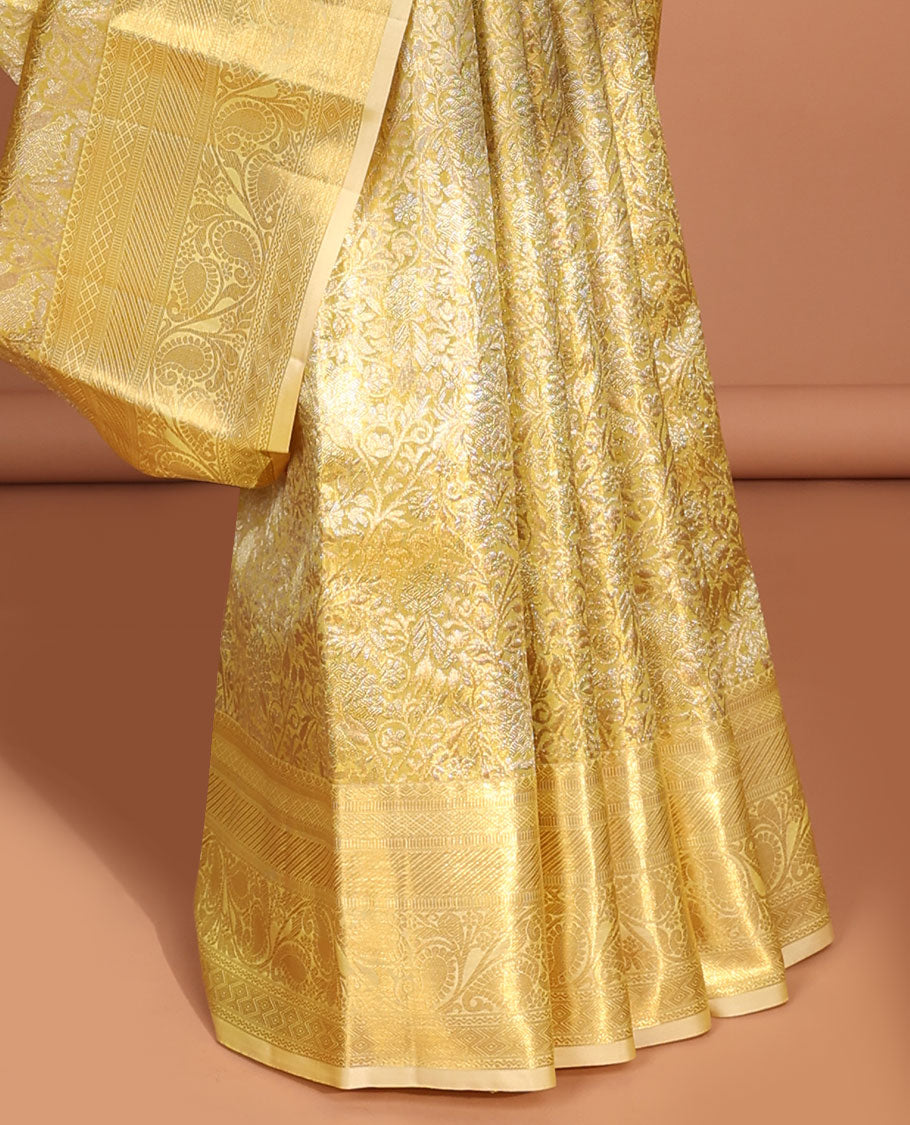 Green  floral vine design kancheepuram tissue silk saree, self border of muthu, banaras, manga design & intricate zari pallu