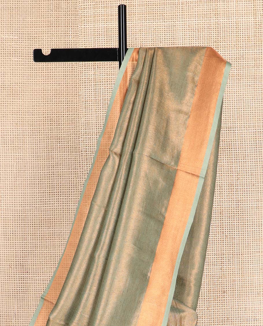 Green plain design linen cotton saree, bavanji zari border, and striped pallu