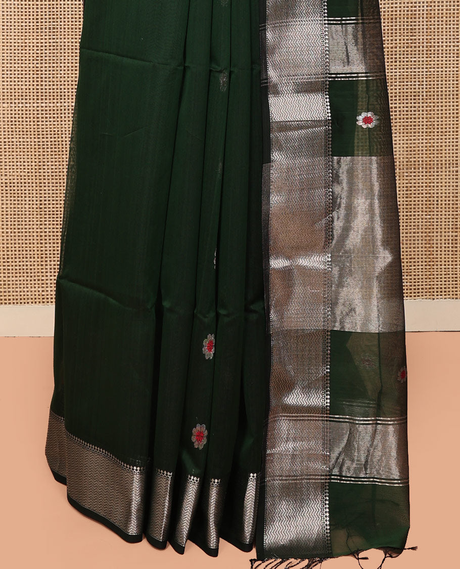 Green Maheshwari Cotton Saree, Bedecked with Meena Buttas All Over Its Body, Highlighted by a Traditional Zari Woven Border, Pallu Steeped with Gleaming Zari Stripes and Buttas, and Paired with a Matching Blouse