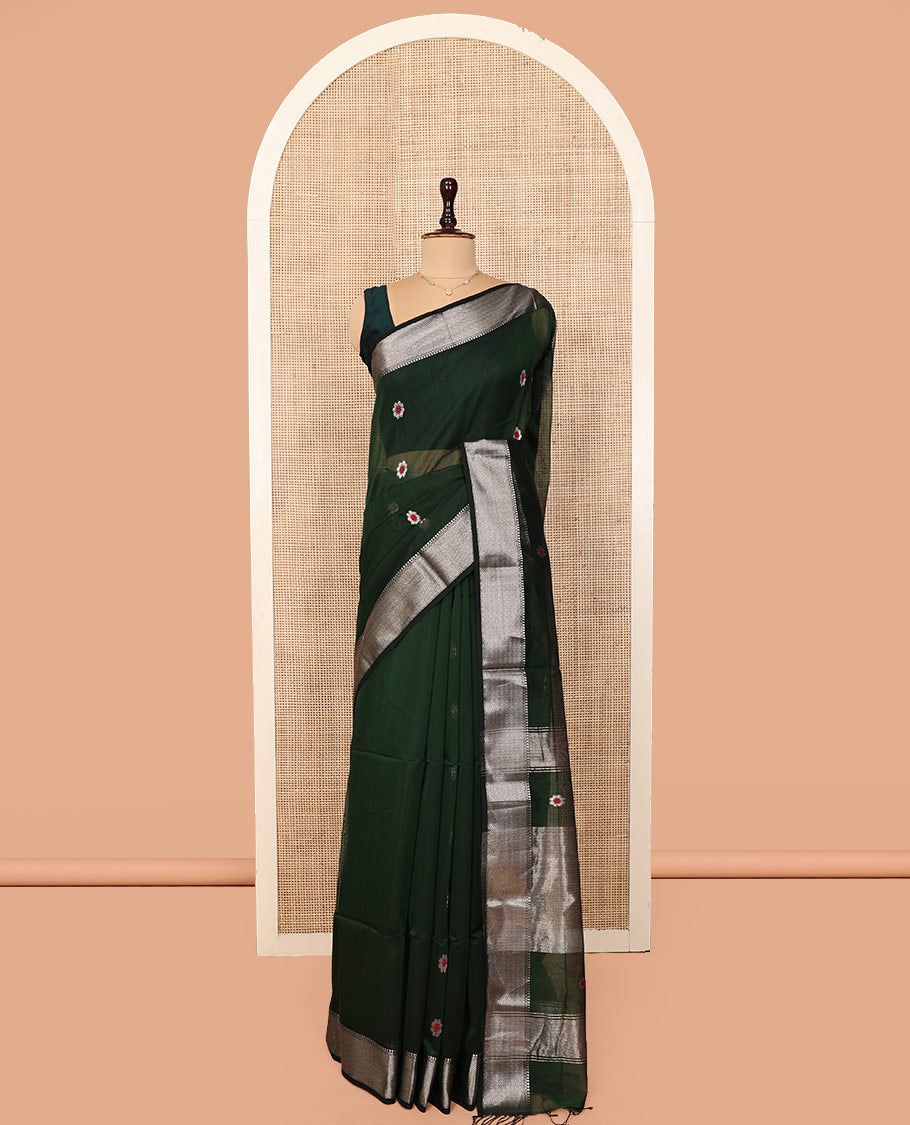 Green Maheshwari Cotton Saree, Bedecked with Meena Buttas All Over Its Body, Highlighted by a Traditional Zari Woven Border, Pallu Steeped with Gleaming Zari Stripes and Buttas, and Paired with a Matching Blouse