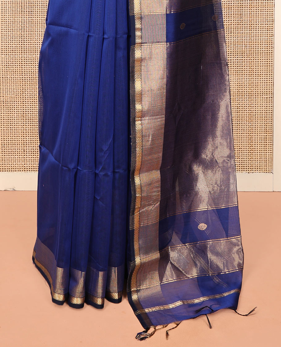 Blue Plain Maheshwari Cotton Saree, Mesmerized with Buttas All Over Its Body, Highlighted by a Zari Border of Traditional Designs, Gleaming Pallu Steeped with Zari Stripes, and Paired with a Matching Blouse