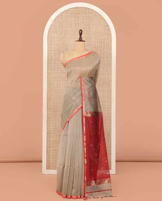 Grey Maheshwari Cotton Saree, Subtly Enriched with Star Buttas All Over Its Body, Contrast Zari Piping Star Buttas Border, Captivating Contrast Pallu Steeped with Star Buttas, and Paired with a Contrast Blouse