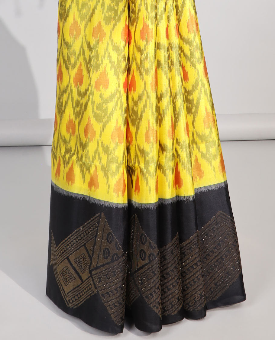 Yellow ikkat style floral vine design soft silk saree with contrast zari border & geometric zari design pallu