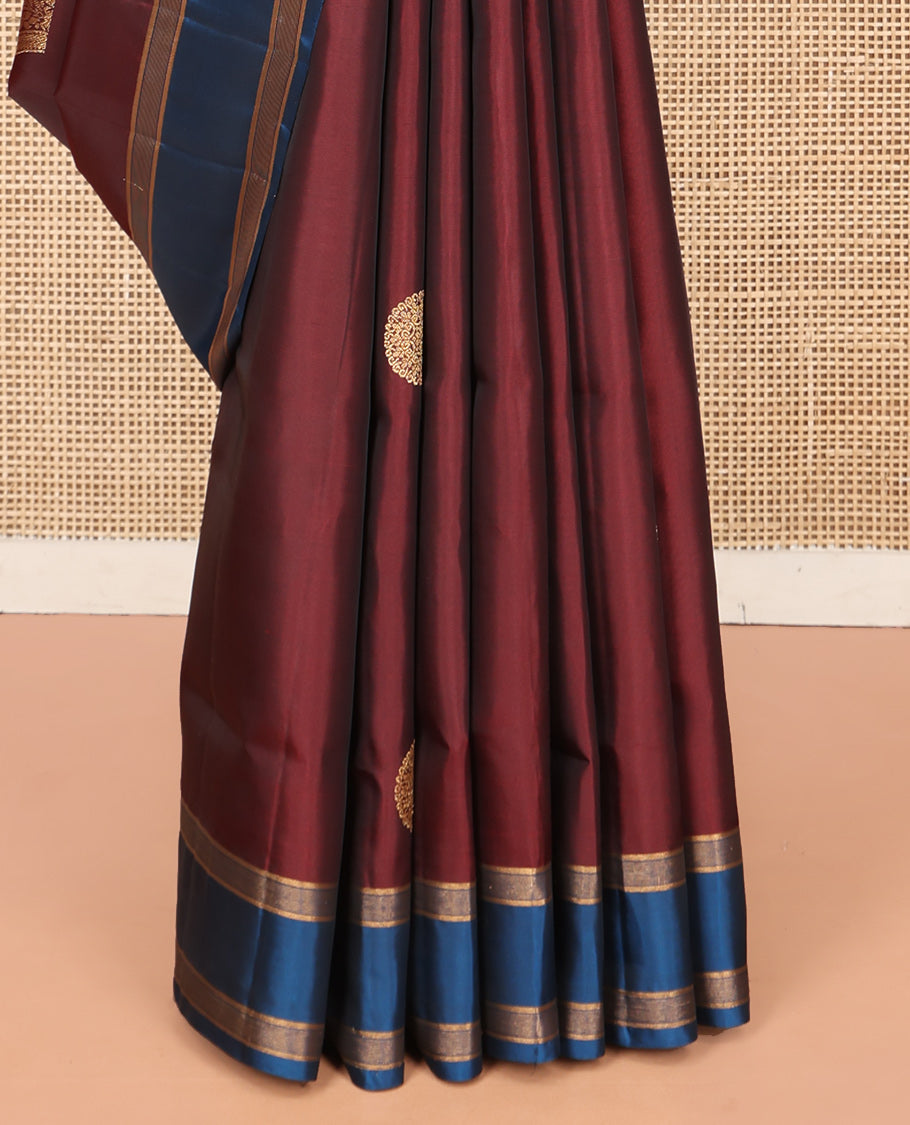 Maroon Mayuri Lite Silk Mix Saree, Gracefully Embellished with Zari Buttas, a Contrast Zari Border, Intricate Pallu, and a Contrast Blouse