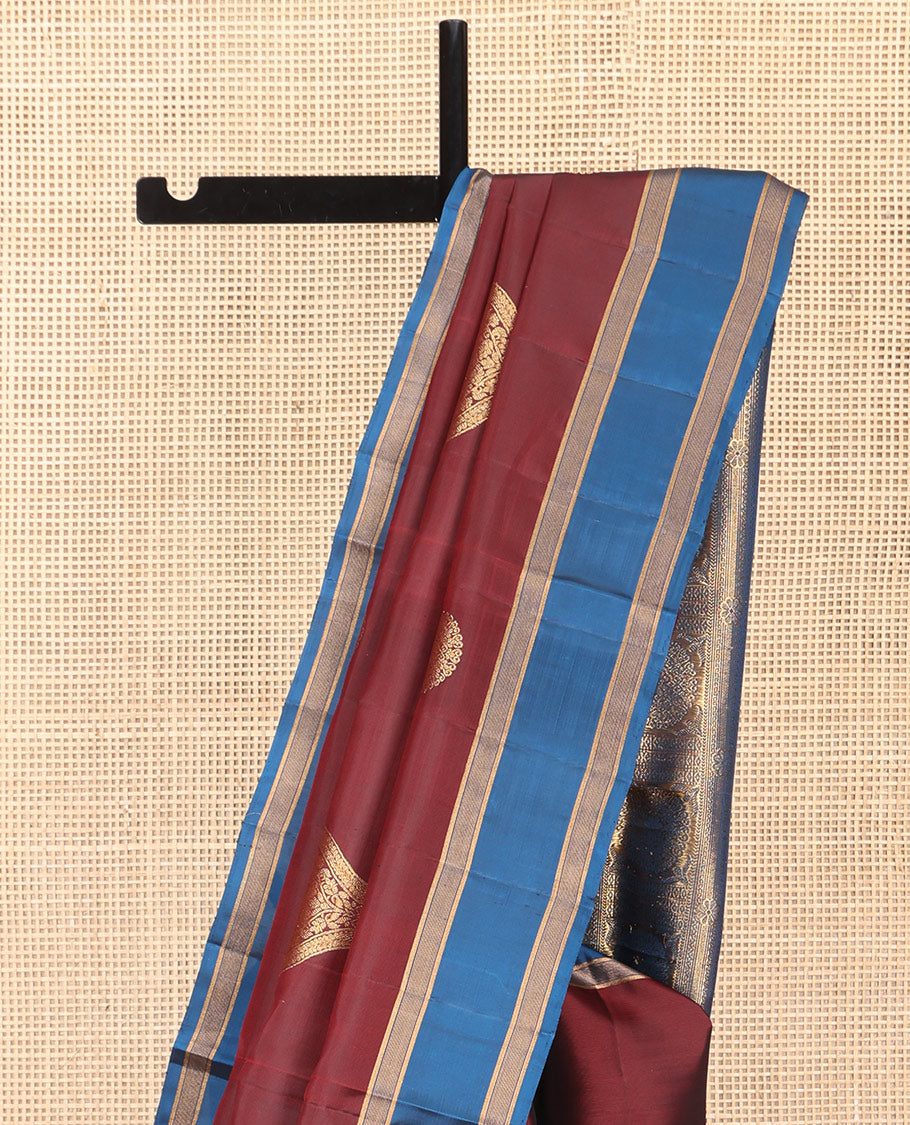 Maroon Mayuri Lite Silk Mix Saree, Gracefully Embellished with Zari Buttas, a Contrast Zari Border, Intricate Pallu, and a Contrast Blouse