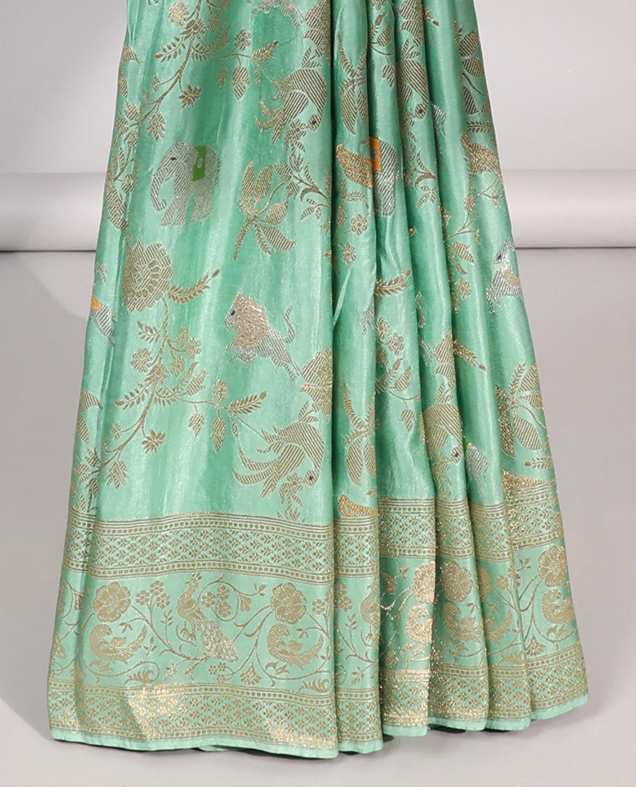 Green floral vine , animal design mushru silk saree with self-zari floral border & floral zari pallu