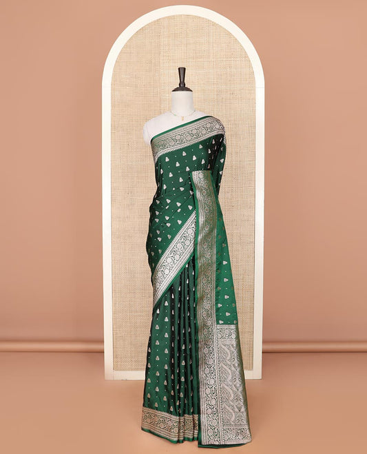 Green zari buttas mushru silk saree, floral creeper design border, and intricately designed pallu