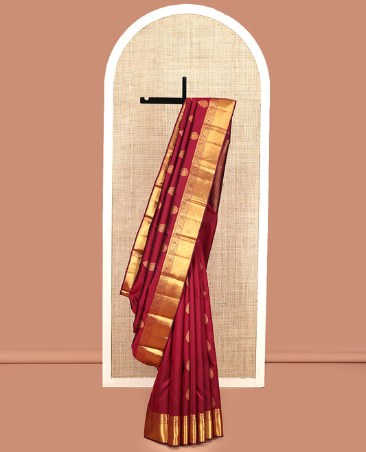 Maroon Parampara Silk Saree, Subtly Sparkled With Zari Buttas and Embossed Texture On Its Body, Highlighted by Zari Border of Arumbu Manga Designs, Grand Pallu, and Paired with a Matching Blouse