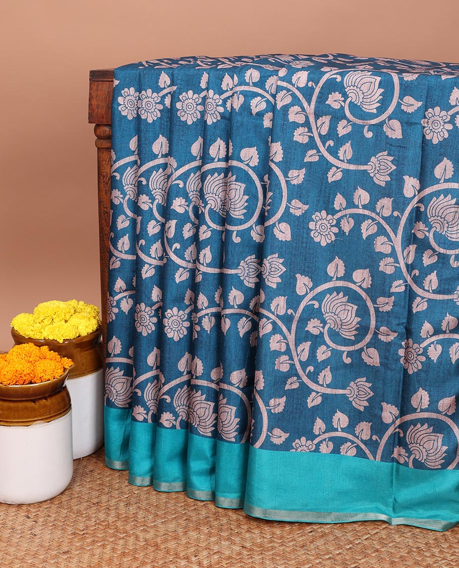 Blue kalamkari printed semi tussar saree with gold zari piping border & printed pallu with tussels along with plain blouse