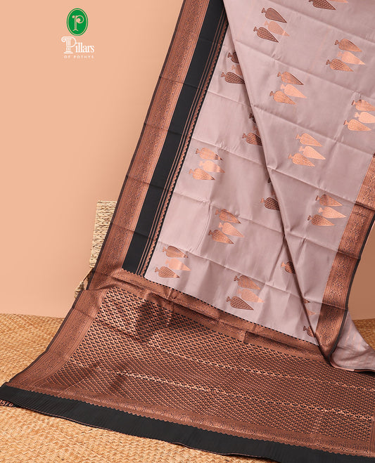 Pastel brown copper zari butta litchi soft silk saree with contrast double pad border & zari butta blouse