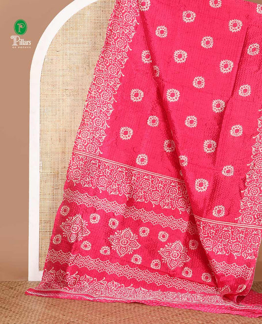 Rani pink batik-floral buttas printed Litchi crushed saree, batik-floral printed border, printed pallu & butta print blouse