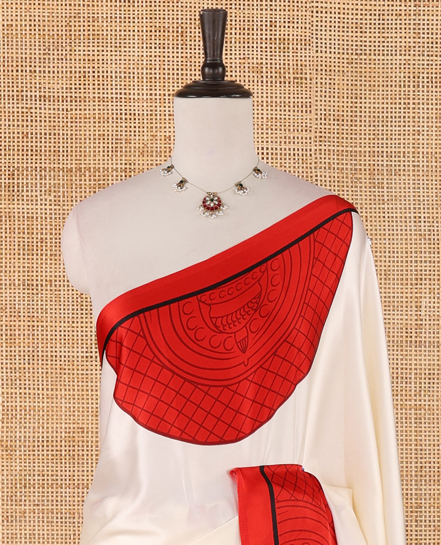 Cream printed semi-modal silk saree,  contrast red border of kathakali motif enclosed semi-circle, kathakali printed pallu & printed blouse