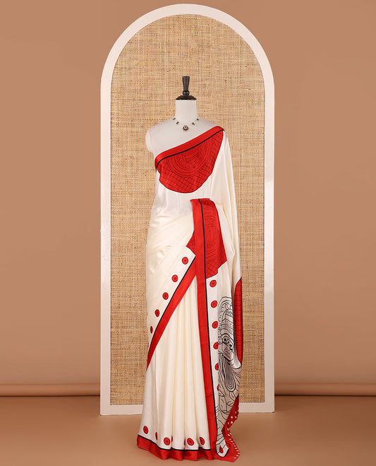 Cream printed semi-modal silk saree,  contrast red border of kathakali motif enclosed semi-circle, kathakali printed pallu & printed blouse