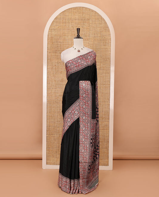 Black plain design Turkey crepe saree, intricately Ajrakh-printed border, pallu & matching blouse