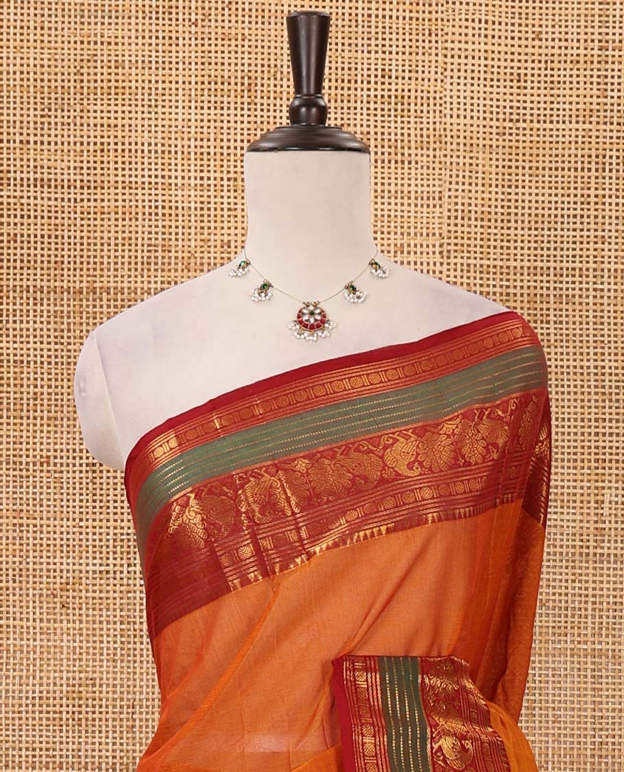 Grey plain Chettinad cotton saree, contrast zari border of temple, rudraksham & annam motifs, striped pallu & matching blouse of zari border