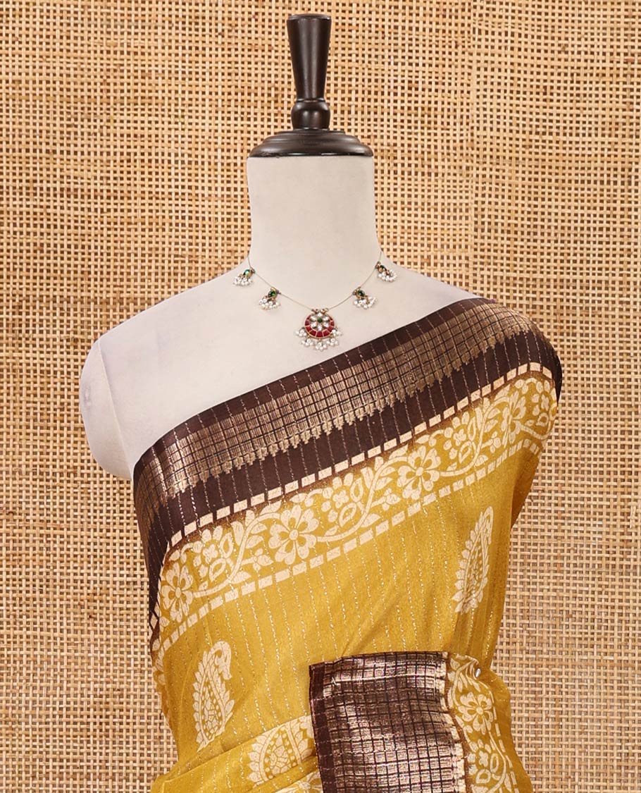 Mustard zari striped & batik paisley-floral printed dola silksaree,contrast zari border,batik paisley print pallu & blouse of print & zari work