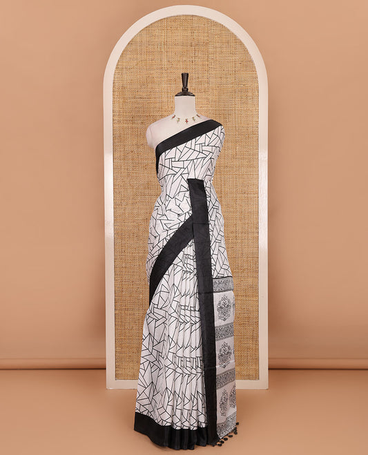 White geometric patterned khadi cotton saree, contrast black plain border & intricately printed pallu