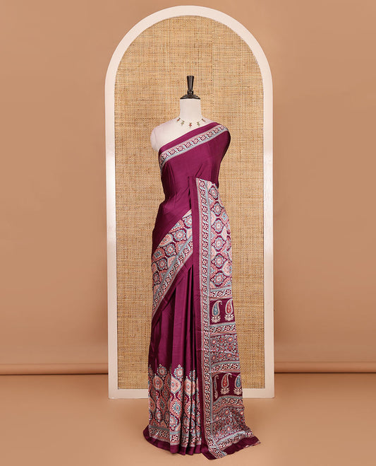 Purple plain gajji silk saree with ajrak printed border, ajrak printed geometric pallu, and printed blouse