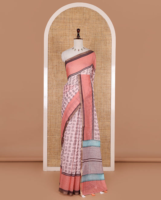Pastel pink cute elephant motifs printed linen cotton saree, contrast chevron border, pallu of stripes and chevron, and contrast printed blouse