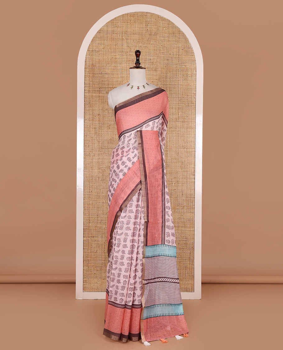 Pastel pink cute elephant motifs printed linen cotton saree, contrast chevron border, pallu of stripes and chevron, and contrast printed blouse