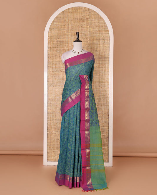 Green vanasingaram style flora-fauna motifs, Chettinad cotton saree, contrast traditional zari border, striped pallu, and contrast blouse