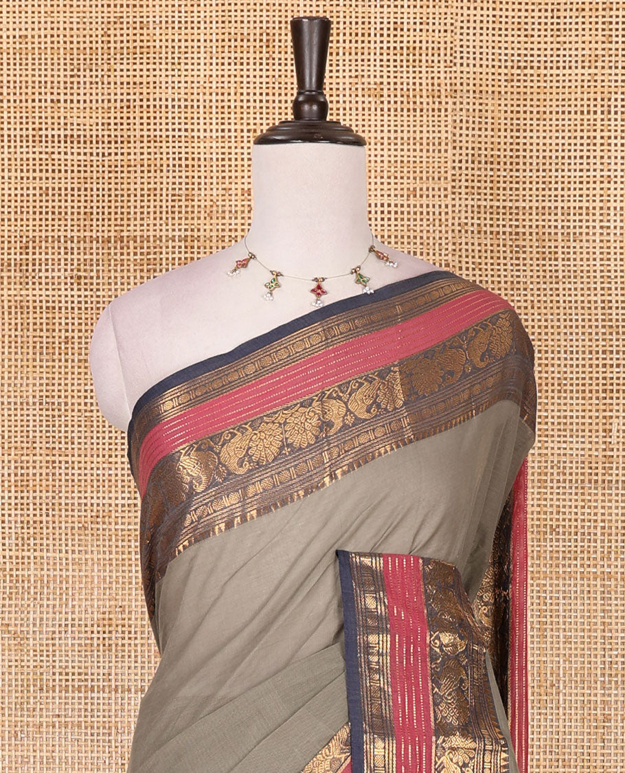 Light grey plain Chettinad cotton saree, contrast rettai rettu annam and temple motif zari border, striped pallu, and matching blouse