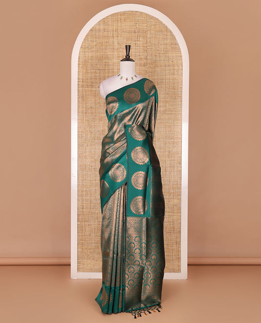 Green jacquard kanchi tissue saree, zari chakram motifs border, intricately zari woven pallu, and a matching zari design blouse