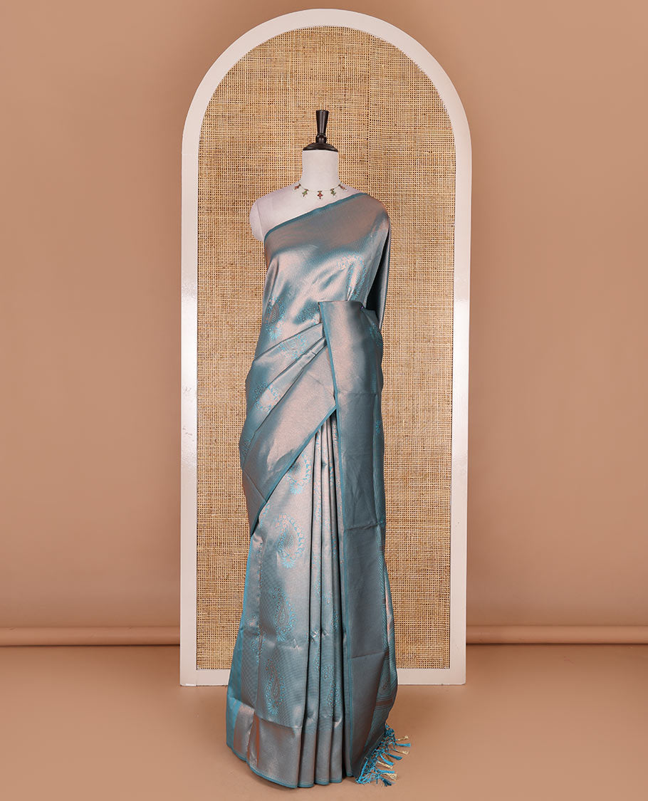 Light blue paisley zari jacquard Kanchi tissue saree, zari border, pallu steeped with paisleys, and jacquard matching blouse