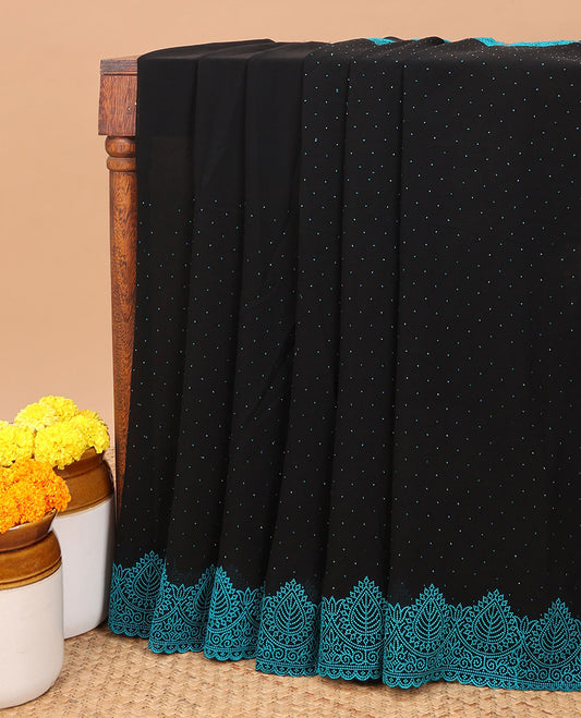 Black with blue all-over stone work chiffon georgette saree with self embroidery border & self pallu along with contrast stone work blouse