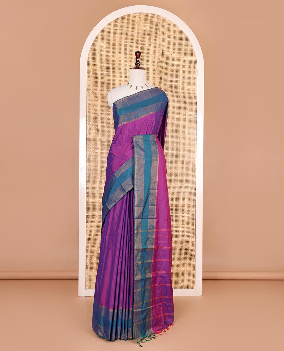 Violet plain semi-soft silk saree, contrast zari striped border, striped pallu, and matching blouse