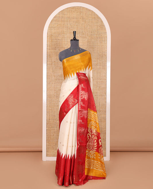 Half-white zari stripes and buttas dola silk saree, contrast red-orange Ganga-Jamuna temple elephant motifs border, paisleys printed pallu, and contrast elephant buttas blouse