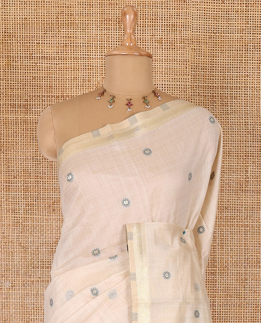 Cream resham thread and zari buttas Munga cotton saree, traditional gold zari border, tree motifs red thread work pallu, and matching buttas blouse