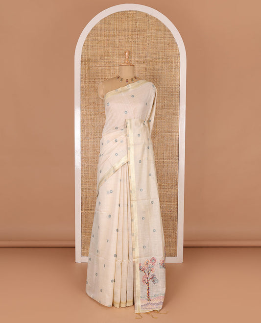 Cream resham thread and zari buttas Munga cotton saree, traditional gold zari border, tree motifs red thread work pallu, and matching buttas blouse