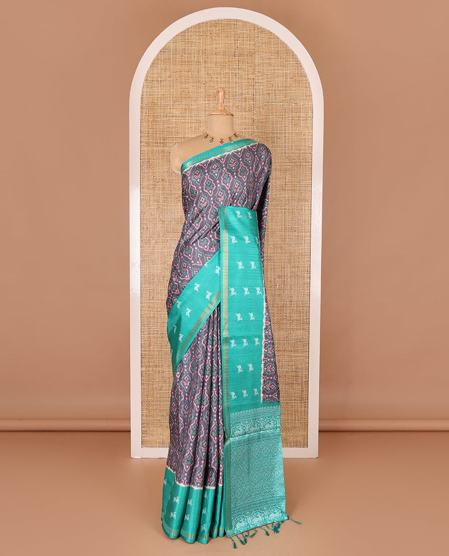 Grey and blue Pochampally ikkat printed katan silk saree, contrast deer motifs printed zari border, jaal printed pallu, and contrast deer motifs printed blouse