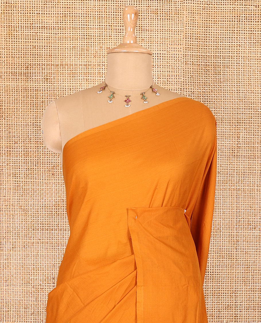 Borderless mustard pear fruit-shaped patchwork South cotton saree with a matching blouse and a contrast paisley vine printed blouse