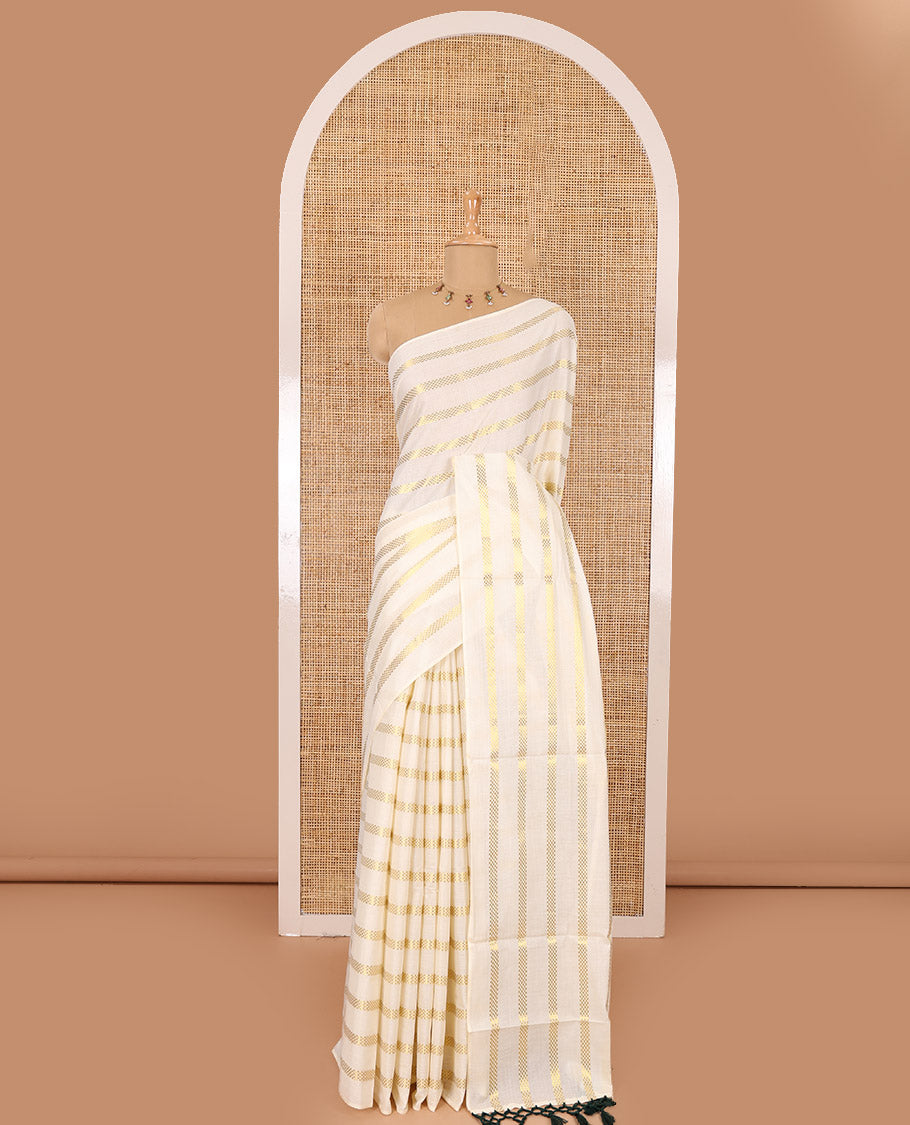 Borderless cream and green horizontal muthu zari striped Kerala cotton saree, self-pallu with tassels, and a matching blouse