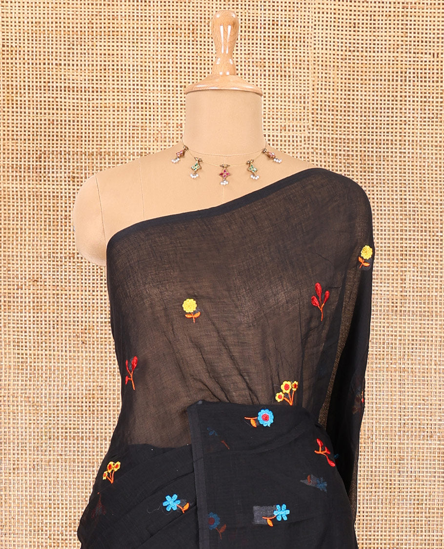 Borderless black floral motifs thread embroidered khadi mul cotton saree, floral motifs thread embroidered pallu, and a matching plain blouse