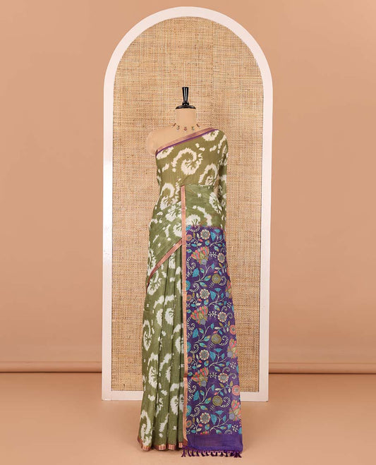 Borderless olive green shibori printed linen cotton saree, contrast kaleidoscope colored kalamkari floral vine print, and a contrast printed blouse