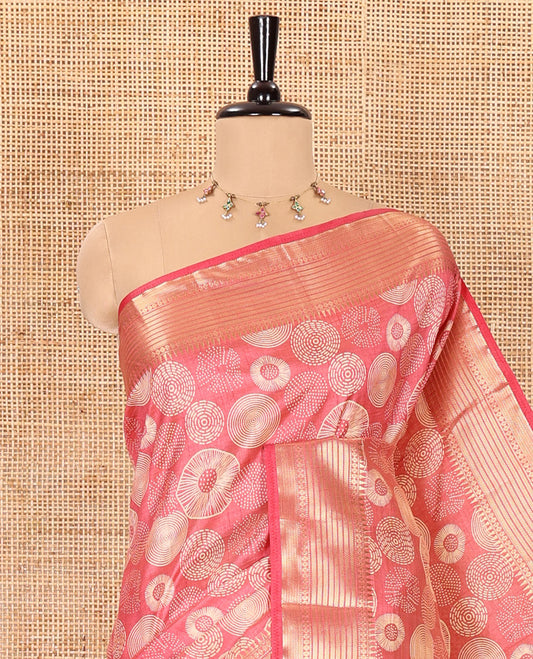 Pink lotus-leaf style printed semi-tussar saree, traditional zari border, zari striped pallu, and a matching blouse