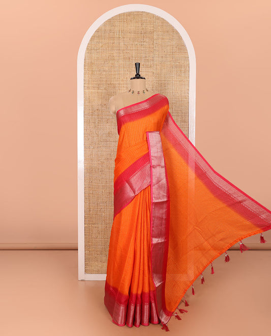 Orange Dola Silk Saree Sparsely Sparked with Vertical Golden Stripes Running All Over Its Body, Complemented by a Contrast Traditional Zari Design Woven Border, Subtly Striped Pallu, and a Contrast Buttas Woven Blouse