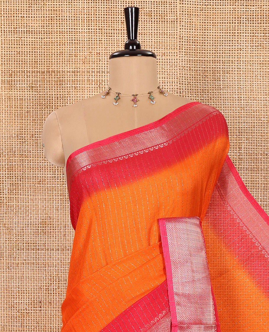 Orange Dola Silk Saree Sparsely Sparked with Vertical Golden Stripes Running All Over Its Body, Complemented by a Contrast Traditional Zari Design Woven Border, Subtly Striped Pallu, and a Contrast Buttas Woven Blouse