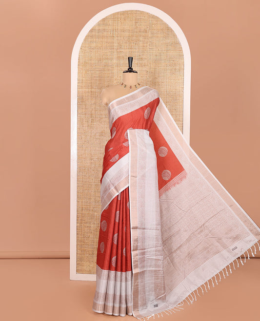 Orange Katan Silk Saree Bedecked with Stripes and Round Buttas on Its Body, Complemented by a Contrast Border of Floral Creeper Designs, Geometric Patterned Pallu, and Paired with a Contrast Blouse