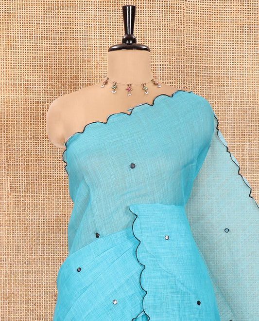 Blue Linen Cotton Saree, Embellished with Mirror Work All Over Its Body, Subtly Scallop Border, Complemented by Contrast Pallu of Stripes and Mirror Work, and Paired with a Contrast Geometric Printed Blouse