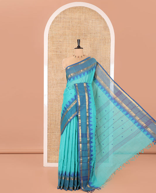 Rama Chettinad Cotton Saree, Subtly Sparkled with Thread Buttas All Over Its Body, Complemented by a Contrast Border Rettai Pettu Border of Paisley and Chevron Stripes, Subtly Designed Pallu, and Paired with a Matching Blouse