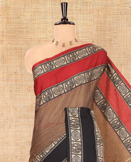 Chikku Plain Mercerised Cotton Saree, Complemented by a Contrast Ganga-Jamuna Rettai Pettu Thread Border of Temple, Elephant, and Chakram Designs, Subtly Striped Pallu, and Paired with a Matching Blouse