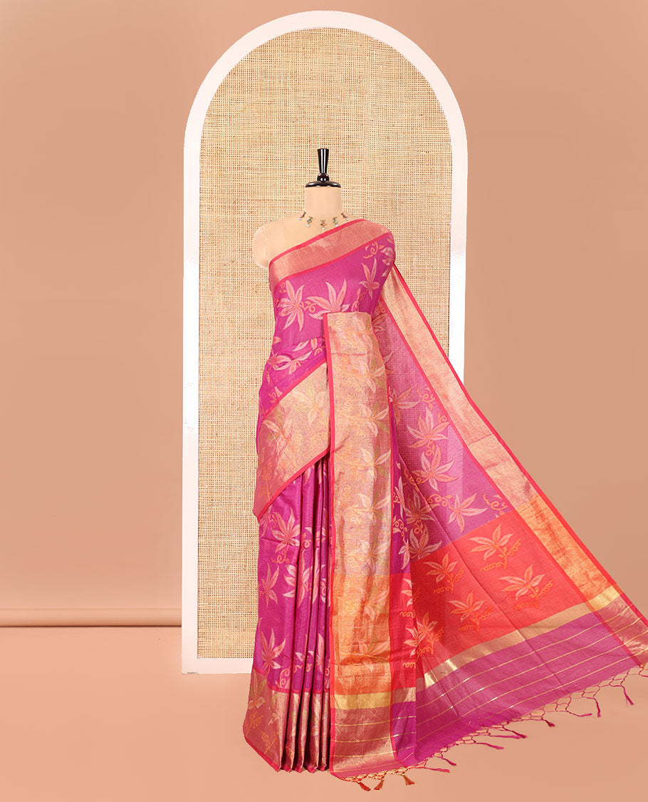 Magenta Chanderi Cotton Saree, Beautified with Leaf Motifs on Its Body, Complemented by a Contrast Border of Leaf Designs, Pallu Steeped with Colorful Floral Designs, and Paired with a Contrast Blouse