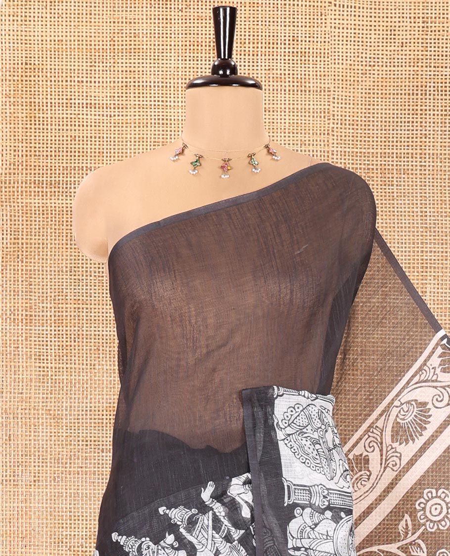 Black Linen Cotton Saree, Artfully Detailed with Kalamkari Human Figurines Printed On Its Body, Highlighted by Self-Pallu Pictures Human Figurines, and Paired with a Printed Blouse
