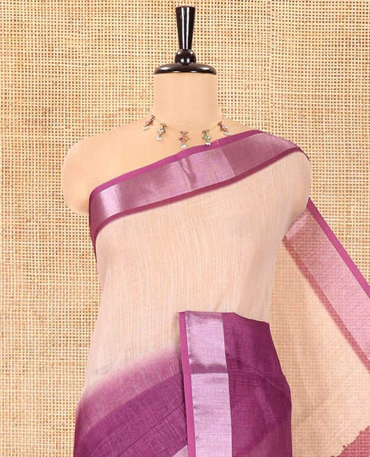 Chikku and Purple Linen Cotton Saree, Subtly Designed with Half-And-Half-Style Dual-Color Dye on Its Body, Complemented by a Contrast Bavanji Border, Pallu of Batik Print, and Paired with a Contrast Blouse